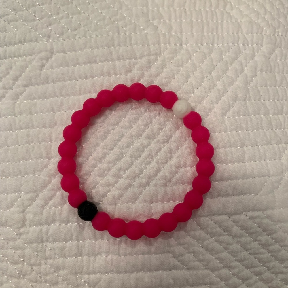 pink lokai bracelet (real)